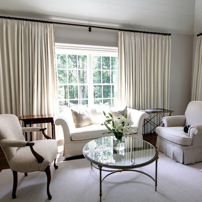 Elegant master dark wood floor bedroom photo in Atlanta with beige walls
