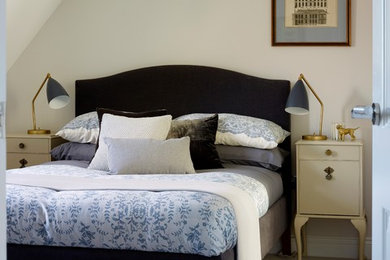 This is an example of a bedroom in Surrey.