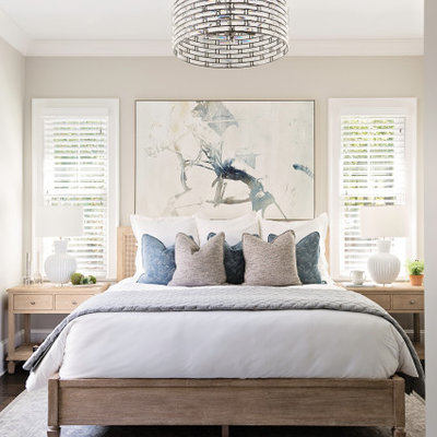 Inspiration for a transitional dark wood floor and brown floor bedroom remodel in Orlando with gray walls
