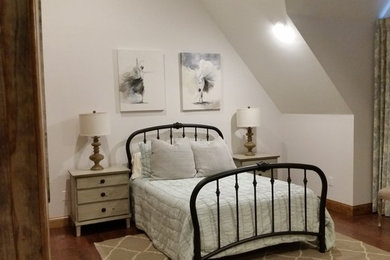 Example of a large transitional bedroom design in Other