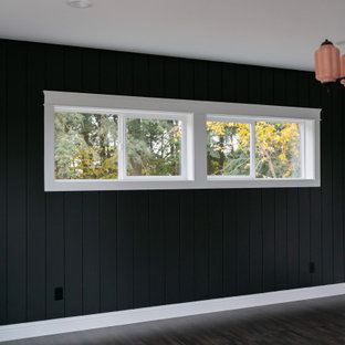 Foto de dormitorio principal, actual, grande, sin chimenea, con paredes verdes, suelo laminado y suelo marrón