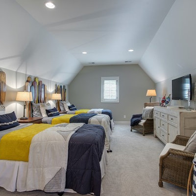 Example of a large beach style guest carpeted bedroom design in Minneapolis with gray walls