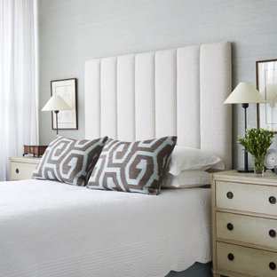 Design ideas for a large contemporary master bedroom in Melbourne with carpet, beige floor, grey walls and wallpaper.