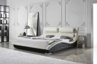 Imagen de dormitorio grande con paredes blancas
