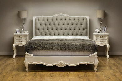 This is an example of a classic bedroom in Other with grey walls.