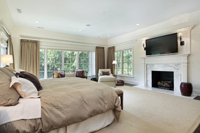 Large elegant dark wood floor bedroom photo in Other with white walls, a standard fireplace and a tile fireplace