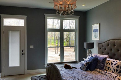 Inspiration for a large timeless master carpeted bedroom remodel in Philadelphia with gray walls