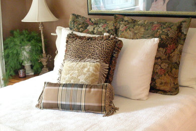 Inspiration for an eclectic guest bedroom remodel in Houston with brown walls