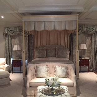 Mid-sized victorian master bedroom in San Diego with beige walls, dark hardwood floors and brown floor.