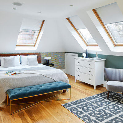 Example of a large trendy bedroom design in Surrey
