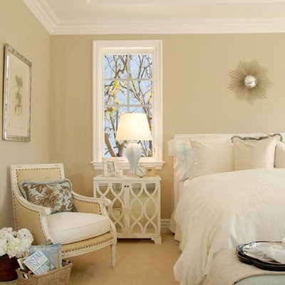 Beach style carpeted bedroom photo in Los Angeles with beige walls