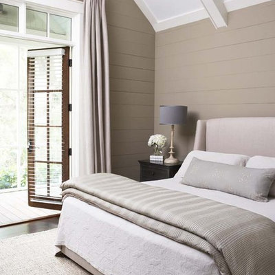 Inspiration for a large timeless master dark wood floor bedroom remodel in Charleston with beige walls and no fireplace