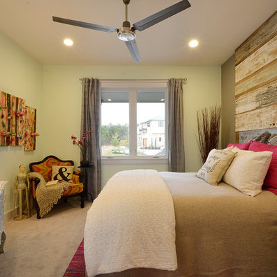Example of a trendy carpeted bedroom design in Austin with gray walls and no fireplace