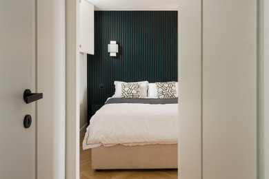 Medium sized scandi master bedroom in Paris with white walls, light hardwood flooring and beige floors.