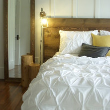 Rustic Bedroom by Christopher Kellie Design Inc.