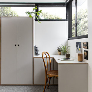 Design ideas for a small scandinavian master bedroom in Sydney with white walls, carpet and grey floor.