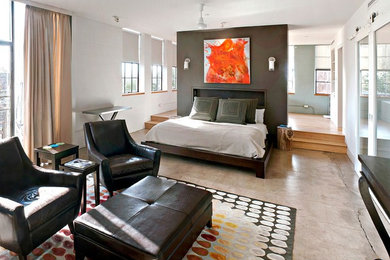 Foto de dormitorio contemporáneo con suelo de cemento y suelo gris