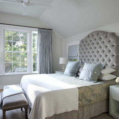 Example of a classic guest bedroom design in Austin with gray walls and no fireplace