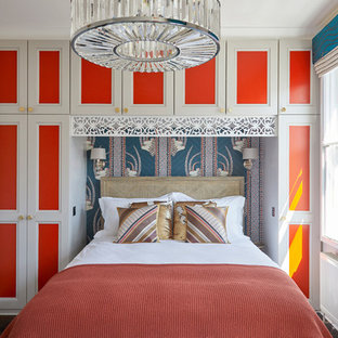 This is an example of a contemporary bedroom in London with grey walls, dark hardwood flooring and brown floors.