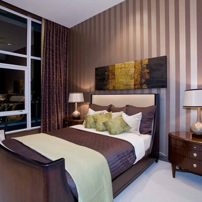 Mid-sized trendy master carpeted and beige floor bedroom photo in Portland with multicolored walls and no fireplace