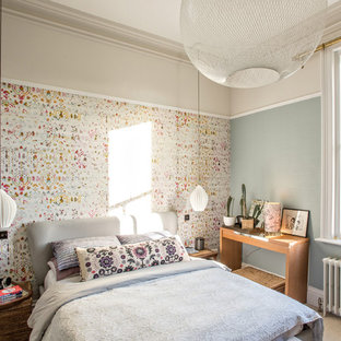 Design ideas for a bohemian bedroom in Manchester with blue walls, carpet and beige floors.