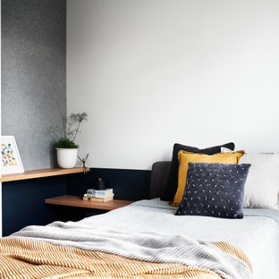 This is an example of a scandinavian bedroom in Sydney.