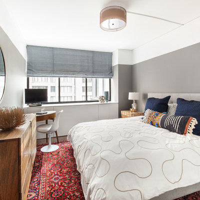 Trendy bedroom photo in Seattle with gray walls and no fireplace