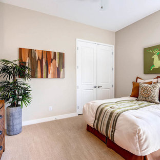 Mid-sized transitional guest carpeted bedroom photo in Las Vegas with beige walls and no fireplace