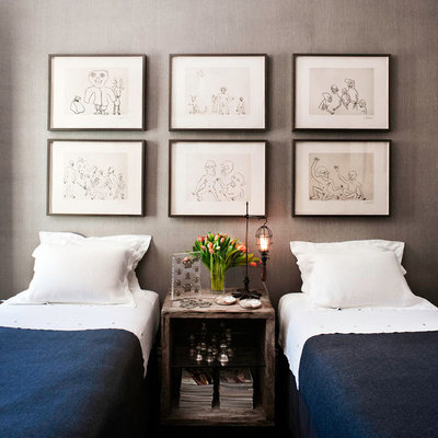 Inspiration for a mid-sized eclectic guest dark wood floor bedroom remodel in San Francisco with gray walls and no fireplace