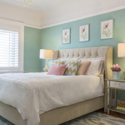 Elegant light wood floor bedroom photo in San Francisco with green walls