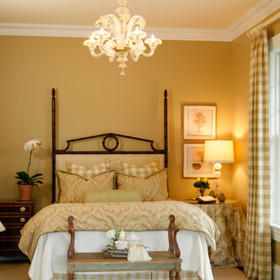 Inspiration for a mid-sized timeless guest carpeted bedroom remodel in New York with beige walls and no fireplace