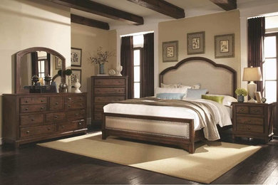 Mid-sized master dark wood floor bedroom photo in Other with beige walls