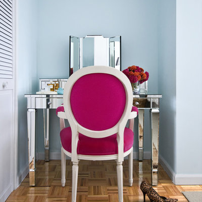Inspiration for a contemporary medium tone wood floor bedroom remodel in New York with blue walls