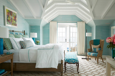 Large beach style master carpeted bedroom photo in New York with blue walls and no fireplace