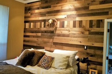 Reclaimed wood wall with built-in platform bed