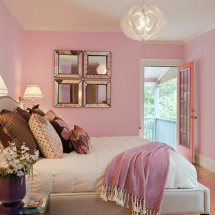 Bedroom - mid-sized eclectic master light wood floor bedroom idea in Orlando with pink walls