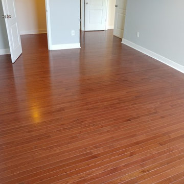 Replace carpet with 2 1/4" solid oak - cherry stain