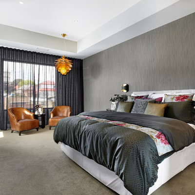 Inspiration for a large contemporary carpeted bedroom remodel in Melbourne with gray walls
