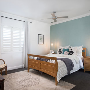 Inspiration for a large contemporary master bedroom in Brisbane with carpet, black floor and grey walls.