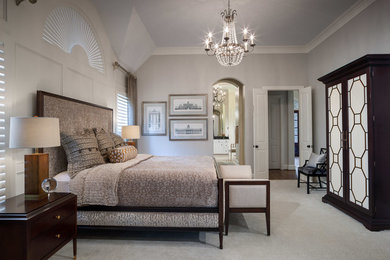 Transitional master carpeted bedroom photo in Houston with no fireplace