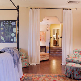 Inspiration for a large timeless master dark wood floor bedroom remodel in Houston with white walls