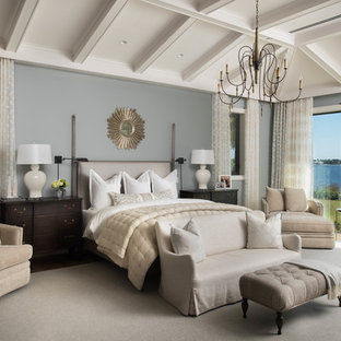 Elegant carpeted and gray floor bedroom photo in Miami with gray walls