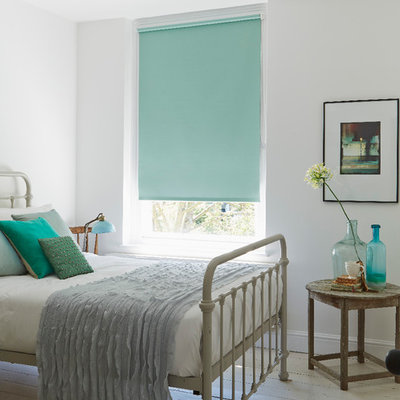 Bedroom - traditional painted wood floor bedroom idea in Other with white walls and no fireplace