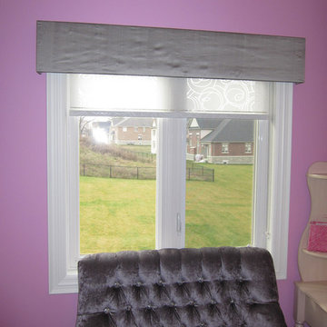 Roller shade with cornice in a King City bedroom