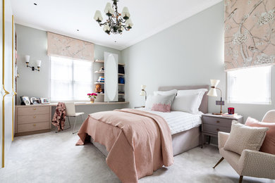 Design ideas for a traditional grey and pink bedroom in London with grey walls, carpet and grey floors.