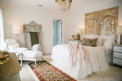 This is an example of a romantic bedroom in Atlanta with white walls.