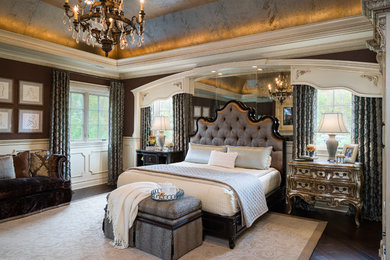 Inspiration for a large timeless master medium tone wood floor bedroom remodel in New York with brown walls