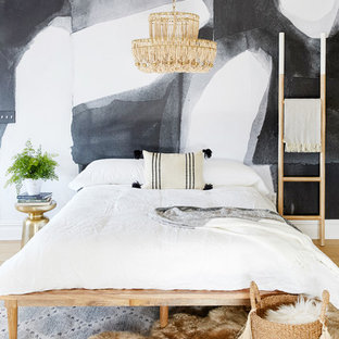 Inspiration for a contemporary guest bedroom remodel with multicolored walls