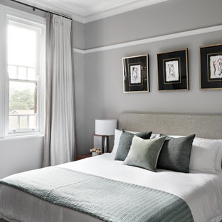 This is an example of a mid-sized transitional master bedroom in Sydney with grey walls, carpet and grey floor.