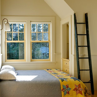 Example of a mountain style guest bedroom design in Burlington with beige walls and no fireplace